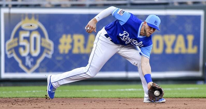 August 25, 2018 - Kansas City, MO, USA - Kansas City Royals third baseman Hunter Dozier stops a ground out on Cleveland Indians Yan Gomes to end the top of the second inning on Saturday, Aug. 25, 2018 at Kauffman Stadium in Kansas City, Mo. Cleveland Indians vs. Kansas City Royals - ZUMAm67_ 20180825_zaf_m67_019 Copyright: xJohnxSleezerx