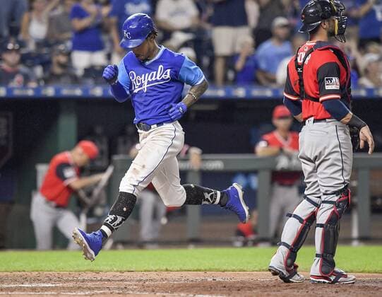 August 25, 2018 - Kansas City, MO, USA - Kansas City Royals second baseman Adalberto Mondesi sprints past Cleveland Indians catcher Yan Gomes to score from first on a double by Whit Merrifield in the seventh inning on Saturday, Aug. 25, 2018 at Kauffman Stadium in Kansas City, Mo. Cleveland Indians vs. Kansas City Royals - ZUMAm67_ 20180825_zaf_m67_081 Copyright: xJohnxSleezerx