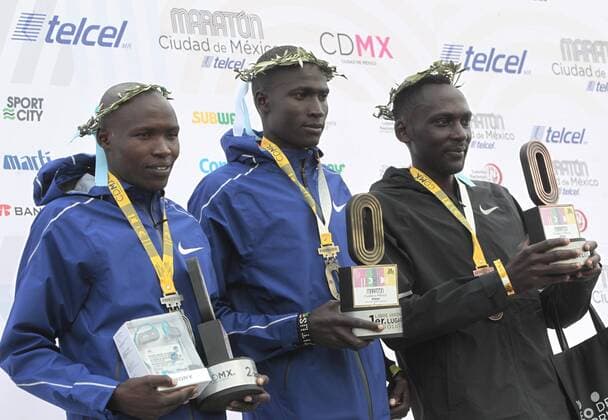 The Kenyan athletes Edwin Koech (L), Titus Ekiru (C) and Matthew Kisorio pose with their medals of silver, gold and bronze respectively in the international race in the men category of the Mexico City Marathon Telcel 2018 with a route of 42 kilometers, starting in the Zócalo and ending at the University Olympic Center of the City of Mexico, Mexico, on 26 August 2018. Marathon of the City of Mexico Telcel 2018 !ACHTUNG: NUR REDAKTIONELLE NUTZUNG!  Copyright: xMarioxGuzmánx MEX01 20180826-636709118385052378