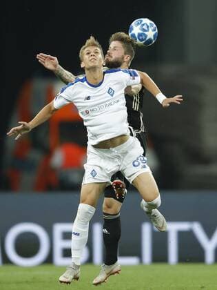(L-R) Vladyslav Supriaha of Dynamo Kyiv, Lasse Schone of Ajax during the UEFA Champions League play offs round second leg match between Dynamo Kyiv and Ajax Amsterdam at the NSK Olimpiyskyi on August 28, 2018 in Kyiv, Ukraine UEFA Champions League 2018 2019 xVIxVIxImagesx xMauricexvanxSteenxIVx 11924219