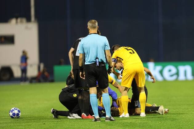 Zagreb, 28 08 2018 - Stadion Maksimir, UEFA Champions League - 2018 19, GNK Dinamo (blue) - BSC Young Boys (yellow) 1:2, Doctors provide first aid to Miralem Sulejmani (7) 