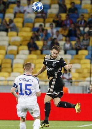 August 28, 2018 - Kiev, Ukraine - VIKTOR TSYGANKOV (L) of Dynamo and DALEY BLIND (R) of Ajax in action during the UEFA Champions League play-off, second leg, soccer match between FC Dynamo Kyiv and Ajax Amsterdam, at the Olimpiyskiy stadium in Kiev, Ukraine, on 28 August 2018. Ajax Amsterdam vs FC Dynamo Kiev , UEFA Champions League soccer match - ZUMAg194 20180828_zap_g194_022 Copyright: xSergxGlovnyx