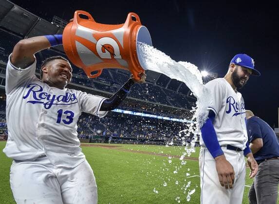 August 28, 2018 - Kansas City, MO, USA - Kansas City Royals starting pitcher Jakob Junis is doused by Kansas City catcher Salvador Perez after pitching a complete game in a 6-2 win against the Detroit Tigers at Kauffman Stadium in Kansas City, Mo., on Tuesday, Aug. 28, 2018. Detroit at Kansas City - ZUMAm67_ 20180828_zaf_m67_050 Copyright: xJohnxSleezerx