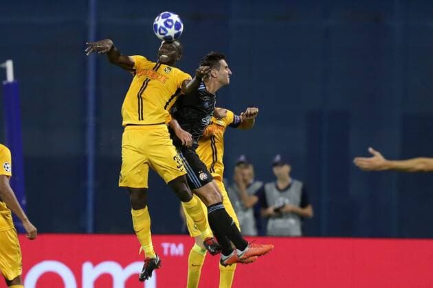 (180829) -- ZAGREB, Aug. 29, 2018 -- Mario Gavranovic (R) of GNK Dinamo Zagreb vies with Sekou Sanogo of BSC Young Boys during UEFA Champions League play-off match in Zagreb, Croatia, on Aug. 28, 2018. Young Boys won 2-1. ) (SP)CROATIA-ZAGREB-FOOTBALL-UEFA CHAMPIONS LEAGUE LukaxStanzl 