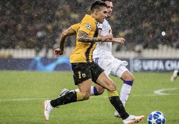 (180829) -- ATHENS, Aug. 29, 2018 -- AEK s Viktor Klonaridis (L) vies with MOL Vidi s Anel Hadzic during the Champions League Play-Off leg 2 soccer match between AEK Athens and MOL Vidi FC at Olympic Stadium in Athens, Greece, on Aug. 28, 2018. ) (SP)GREECE-ATHENS-SOCCER-CHAMPIONS LEAGUE-AEK ATHENS VS MOL VIDI FC PanagiotisxMoschandreou 