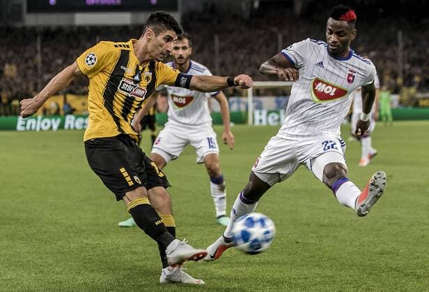 (180829) -- ATHENS, Aug. 29, 2018 -- AEK s Petros Mantalos (L) vies with MOL Vidi s Stopira during the Champions League Play-Off leg 2 soccer match between AEK Athens and MOL Vidi FC at Olympic Stadium in Athens, Greece, on Aug. 28, 2018. ) (SP)GREECE-ATHENS-SOCCER-CHAMPIONS LEAGUE-AEK ATHENS VS MOL VIDI FC PanagiotisxMoschandreou 