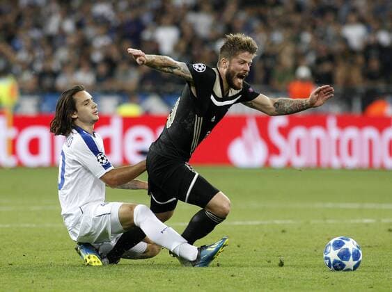 August 28, 2018 - Mykola Shaperenko ( R) of Dynamo vies with Lasse Schone (L) of Ajax during the UEFA Champions League play off, second leg soccer match between Ajax and Dynamo Kyiv in Kyiv, Ukraine, 28 August 2018 UEFA Soccer 2018: Ajax 0:0 Dynamo Kyiv - ZUMAs334 20180828_zap_s334_013 Copyright: xAnatoliixStepanovx