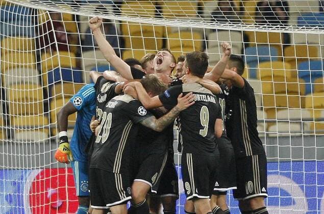 August 28, 2018 - Kiev, Ukraine - Ajax players celebrate the victory during the UEFA Champions League play-off, second leg, soccer match between FC Dynamo Kyiv and Ajax Amsterdam, at the Olimpiyskiy stadium. Ajax qualified for the Champions League. Soccer 2018: Ajax 0:0 (3-1) Dynamo Kiev - ZUMAg194 20180828_zap_g194_016 Copyright: xSergxGlovnyx