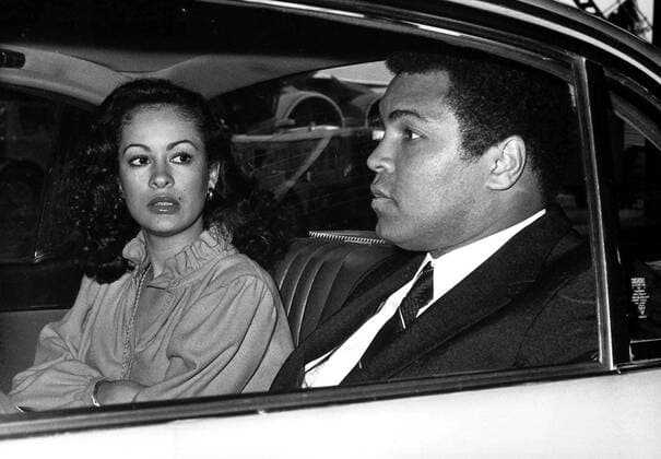 PRESIDENT CARTER S ROVING AMBASSADOR - FORMER WORLD BOXING CHAMPION - MUHAMMAD ALI AND HIS WIFE VERONICA, AT LONDON S HEATROW AIRPORT AFTER TODAY S ARRIVAL FROM LOS ANGELES. ALI CONFESSED THAT HE WAS NOT TOO HAPPY WITH THE SUCCESS OF HIS RECENT AFRICAN TOUR. HE WAS SENT BY PRESIDENTY CARTER TO PERSUADE THE AFRICAN STATES TO BOYCOTT THE MOSCOW OLYMPICS. TOMORROW ALI FLIES TO SAUDI ARABIA TO DO SOME ADVERTISING WORK.. .JEP WST BELGA  x85196510stx