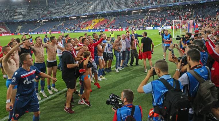 SOCCER - CL quali, RBS vs Belgrade SALZBURG,AUSTRIA,29.AUG.18 - SOCCER - UEFA Champions League qualification play-off, Red Bull Salzburg vs FC Red Star Belgrade. Image shows fans of FC Red Star Belgrade. Keywords: rejoycing. GEPAxpictures xThomasxBachun