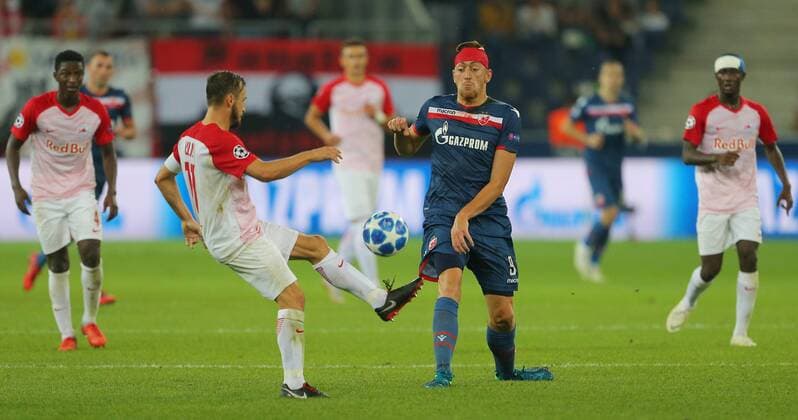 SOCCER - CL quali, RBS vs Belgrade SALZBURG,AUSTRIA,29.AUG.18 - SOCCER - UEFA Champions League qualification play-off, Red Bull Salzburg vs FC Red Star Belgrade. Image shows Andreas Ulmer (RBS) and Milan Pavkov (Belgrade). GEPAxpictures xThomasxBachun