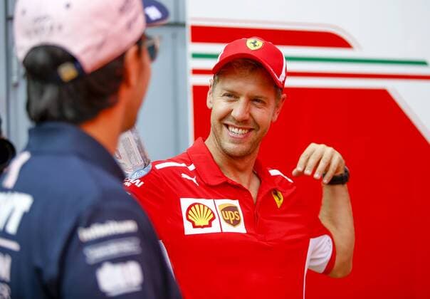 Motorsports: FIA Formula One World Championship WM Weltmeisterschaft 2018, Grand Prix of Italy, 11 Sergio Perez (MEX, Racing Point Force India F1 Team), 5 Sebastian Vettel (GER, Scuderia Ferrari), Monza Italy
