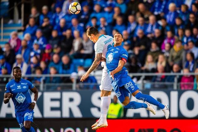 180830 Anton Zabolotny or Zenit and Lunan Ruben Gabrielsen or Molde during the UEFA Europa League playoff match between Molde and FK Zenit St. Petersburg on August 30, 2018 in Molde  Copyright: MARIUSxSIMENSEN BB180830BB507