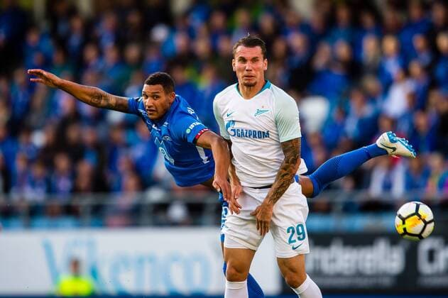 180830 Anton Zabolotny or Zenit and Lunan Ruben Gabrielsen or Molde during the UEFA Europa League playoff match between Molde and FK Zenit St. Petersburg on August 30, 2018 in Molde  Copyright: MARIUSxSIMENSEN BB180830BB508