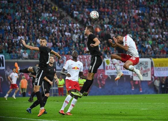 Vitaly Vernydub Sorja Luhansk Ibrahima Konate RB Leipzig Igor Kharatin Sorja Luhansk Matheus Cunha RB Leipzig 30 08 2018 Copyright: xMatthiasxKochx