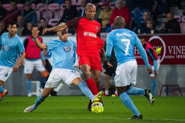 180830 Ayo Simon Okosun of Midtjylland and Rasmus Bengtsson of Malmö FF during the Europe League qualifying match between Midtjylland and Malmö FF on August 30, 2018 in Herning Photo Ludvig Thunman BILDBYR N code LT 35529  Copyright: LUDVIGxTHUNMAN BB180830LT062