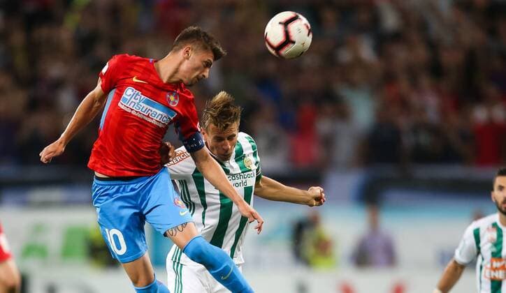 SOCCER - EL quali, Steaua vs Rapid BUCHAREST,ROMANIA,30.AUG.18 - SOCCER - UEFA Europa League, qualification, play off, Steaua Bukarest vs SK Rapid Wien. Image shows Florin Tanase (Steaua) and Stefan Schwab (Rapid). Keywords: Wien Energie. GEPAxpictures xPhilippxBrem