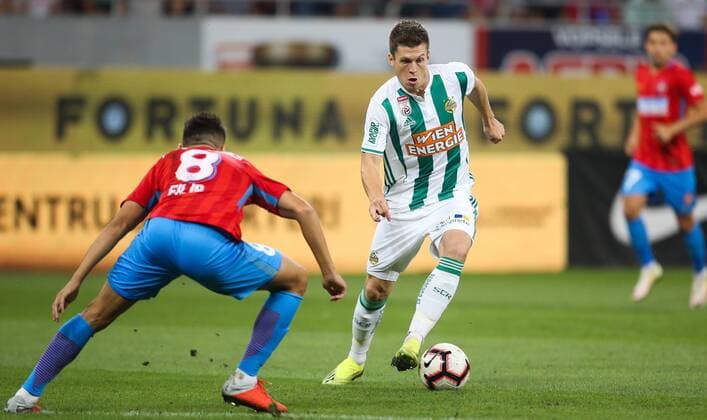 SOCCER - EL quali, Steaua vs Rapid BUCHAREST,ROMANIA,30.AUG.18 - SOCCER - UEFA Europa League, qualification, play off, Steaua Bukarest vs SK Rapid Wien. Image shows Lucian Filip (Steaua) and Deni Alar (Rapid). Keywords: Wien Energie. GEPAxpictures xPhilippxBrem