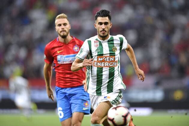FCSB - SK Rapid Wien SK Rapid Wien s Andrei Ivan in action against FCSB s Bogdan Planic during UEFA Europa League 2018 2019, Play-Offs, 2st leg match between FCSB and SK Rapid Wien, on National Arena, Bucharest, Romania, 30 August 2018 Copyright: xAlexxNicodimx