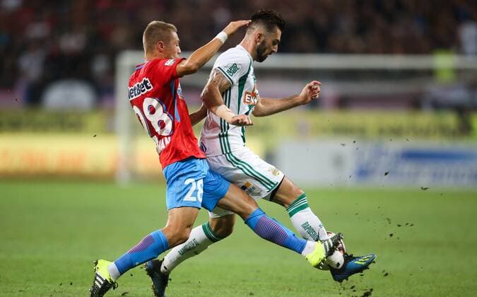 SOCCER - EL quali, Steaua vs Rapid BUCHAREST,ROMANIA,30.AUG.18 - SOCCER - UEFA Europa League, qualification, play off, Steaua Bukarest vs SK Rapid Wien. Image shows Mihai Roman (Steaua) and Marvin Potzmann (Rapid). Keywords: Wien Energie. GEPAxpictures xPhilippxBrem