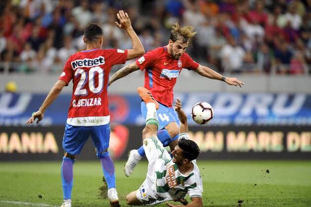 FCSB - SK Rapid Wien FCSB s Mihai Balasa in action against SK Rapid Wien s Andrei Ivan during UEFA Europa League 2018 2019, Play-Offs, 2st leg match between FCSB and SK Rapid Wien, on National Arena, Bucharest, Romania, 30 August 2018 Copyright: xAlexxNicodimx