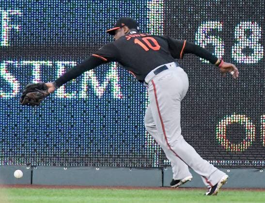 August 31, 2018 - Kansas City, MO, USA - Baltimore Orioles center fielder Adam Jones can t reach a double by the Kansas City Royals Whit Merrifield in the first inning at Kauffman Stadium in Kansas City, Mo., on Friday, Aug. 31, 2018. Baltimore at Kansas City - ZUMAm67_ 20180831_zaf_m67_016 Copyright: xJohnxSleezerx