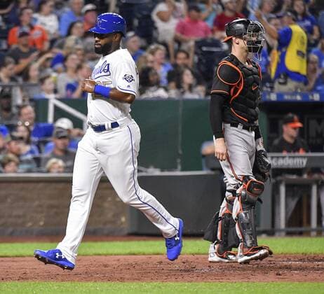 August 31, 2018 - Kansas City, MO, USA - The Kansas City Royals Brian Goodwin scores behind Baltimore Orioles catcher Caleb Joseph on a sacrifice fly by Whit Merrifield in the fourth inning at Kauffman Stadium in Kansas City, Mo., on Friday, Aug. 31, 2018. Baltimore at Kansas City - ZUMAm67_ 20180831_zaf_m67_017 Copyright: xJohnxSleezerx