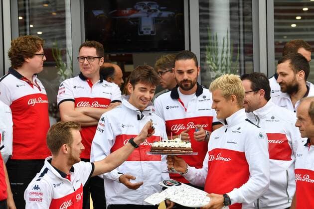 left Charles Leclerc Alfa Romeo Sauber F1 Team passes birthday cake to Marcus Ericsson Alfa Romeo Sauber F1 Team Italian Grand Prix Renntag 02 09 2018 ITA Italian Grand Prix 02 09 2018 Monza Copyright: xEIBNER JerryxAndrex EP_EER