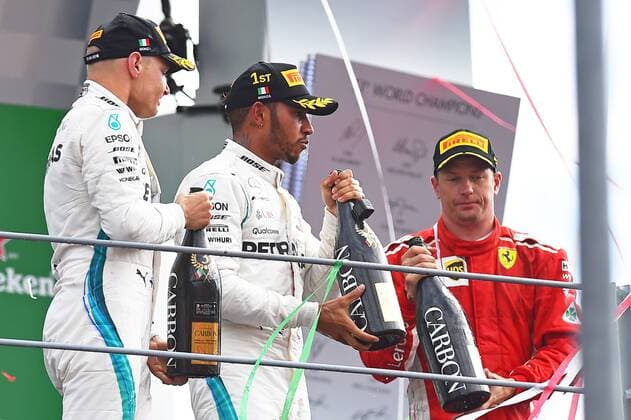 xekx 31 08 02 09 2018 FIA Formula 1 Championship Formula 1 Grand Prix of Italy 2018 GP Italia Monza In the picture v l 3 place Valtteri Bottas FIN 77 Mercedes AMG Petronas Motorsport winner Lewis Hamilton GBR 44 2 place Kimi Raikkonen FIN 7 Scuderia Ferrari Monza Italy eel-fotografie Eberhard Krieger