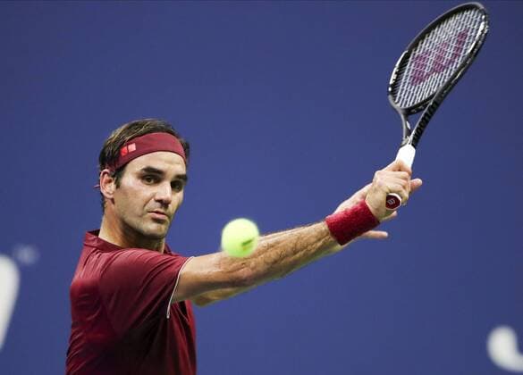 (180904) -- NEW YORK, Sept. 4, 2018 (Xinhua) -- Roger Federer of Switzerland hits a return during the men s singles fourth round match against John Millman of Australia at the 2018 US Open in New York, the United States, Sept. 3 2018. Millman won 3-1. (Xinhua Wang Ying) (SP)US-NEW YORK-TENNIS-US OPEN-MEN S SINGLES 