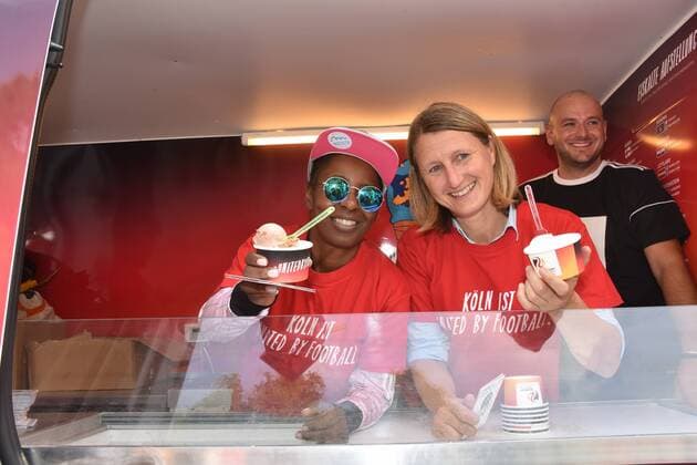 The Cologne sports ambassador presenter Shary Reeves l and ex football player Sonja Fuss distribute ice cream cups on 04 09 2018 in Cologne distribute the Cologne ambassadors of the possible football EM 2024 in Germany under the slogan 2024 balls EiscrEM ice as anticipation of Cologne as a venue