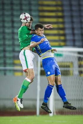 7th September, Olympic Stadium Adem Jashari, Mitrovice, Kosovo; UEFA Under 21 European Championship EM Europameisterschaft qualifier, Kosovo U21 U 21 versus Republic of Ireland U21; Ryan Sweeney of Republic of Ireland wins the clearing header on Ron Broja of Kosovo  ActionPlus12060709 NikolaxKrstic