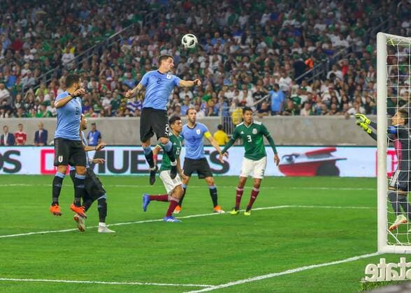 HOUSTON, TX - SEPTEMBER 07: Uruguay defender Jose Maria Gimenez (2) heads the ball into the goal zone during the soccer match between Mexico and Uruguay on September 7, 2018 at NRG Stadium in Houston, Texas. (Photo by Leslie Plaza Johnson Icon Sportswire) SOCCER: SEP 07 Mexico v Uruguay Icon180907006 EDITORIAL USE ONLY