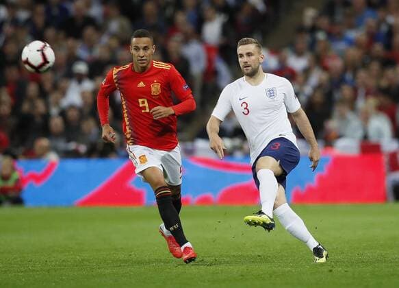 Luke Shaw of England clears the ball under pressure from Rodrigo of Spain during the UEFA Nations League - League A - Group 4 match at Wembley Stadium, London. Picture date 8th September 2018. Picture credit should read: David Klein Sportimage EDITORIAL USE ONLY. No use with unauthorised audio, video, data, fixture lists, club league logos or live services. Online in-match use limited to 120 images, no video emulation. No use in betting, games or single club league player publications.