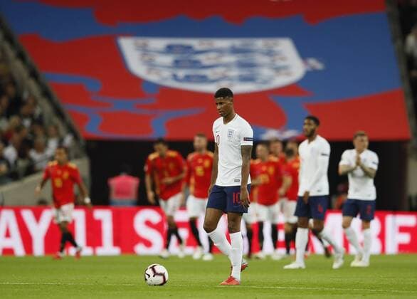 Marcus Rashford of England walks back to centre circle as Spain celebrate their equalising goal behind him during the UEFA Nations League - League A - Group 4 match at Wembley Stadium, London. Picture date 8th September 2018. Picture credit should read: David Klein Sportimage EDITORIAL USE ONLY. No use with unauthorised audio, video, data, fixture lists, club league logos or live services. Online in-match use limited to 120 images, no video emulation. No use in betting, games or single club league player publications.