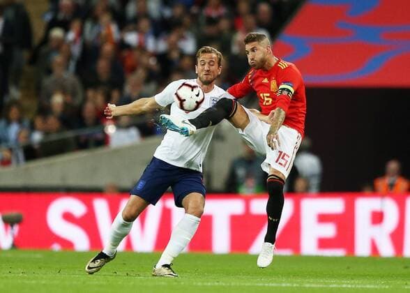 8th September 2018, Wembley Stadium, London, England; UEFA Nations League football, England versus Spain; Harry Kane of England and Sergio Ramos of Spain compete for the ball  ActionPlus12061056 JohnxPatrickxFletcher