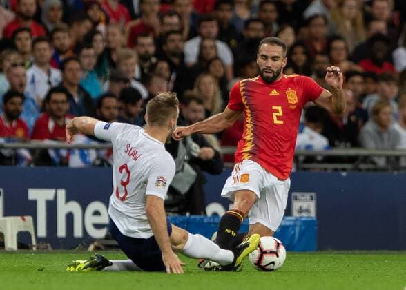 Football - 2018 2019 UEFA Nations League A - Group Four: England vs. Spain Luke Shaw (England) slides into the tackles with Dani Carvajal (Spain) at Wembley Stadium. COLORSPORT DANIEL BEARHAM  csp_eng_spa_080918_