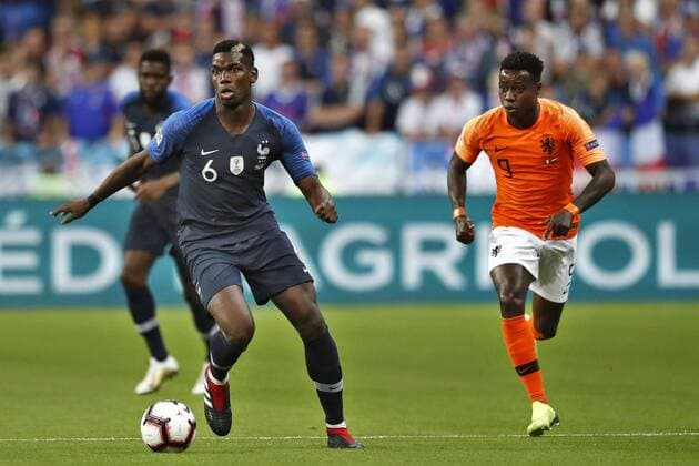 SAINT DENIS, 09-09-2018, Stadium Stade France , football, season 2018 2019, Nations Cup. Netherlands player Quincy Promes (R) and France player Paul Pogba (L) on the ball during the game France - Netherlands . France - Netherlands  x2457071x