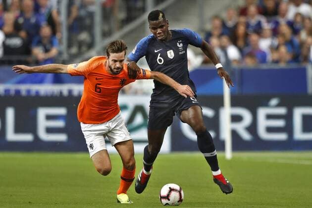 SAINT DENIS, 09-09-2018, Stadium Stade France , football, season 2018 2019, Nations Cup. Netherlands player Davy Propper (L) and France player Paul Pogba (R) during the game France - Netherlands . France - Netherlands  x2457151x