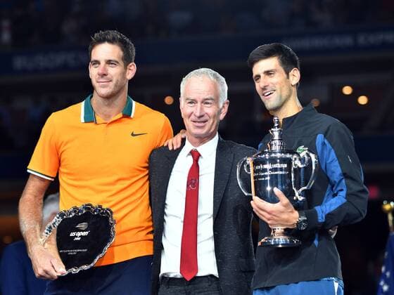 FLUSHING MEADOW, NY - SEPTEMBER 09: Juan Martin del Potro (ARG), and Novak Djokovic (SRB) pose with John McEnroe and trophies after Djokovic defeated del Potro in the final of the Men s Singles Championships at the US Open on September 09, 2018, played at the Billie Jean King Tennis Center in Flushing Meadow, NY. (Photo by Cynthia Lum Icon Sportswire) TENNIS: SEP 09 US Open Icon250180909009 EDITORIAL USE ONLY