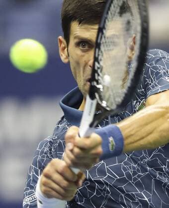 (180910) -- NEW YORK, Sept. 10, 2018 -- Novak Djokovic of Serbia returns the ball during the men s singles final against Juan Martin del Potro of Argentina at the 2018 US Open tennis championships in New York, the United States, Sept. 9, 2018. Djokovic claimed the title with 3-0 in the final. )(wll) (SP)US-NEW YORK-TENNIS-US OPEN-MEN S SINGLES-FINAL WangxYing 