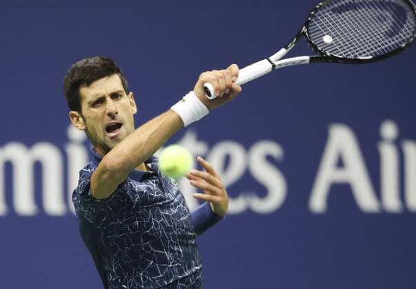 (180910) -- NEW YORK, Sept. 10, 2018 -- Novak Djokovic of Serbia hits a return during the men s singles final match against Juan Martin del Potro of Argentina at the 2018 US Open tennis tournament in New York, the United States, Sept. 9, 2018. Djokovic claimed the title by defeating Juan Martin del Potro of Argentina with 3-0 in the final. ) (SP)US-NEW YORK-TENNIS-US OPEN-MEN S SINGLES-FINAL WangxYing 