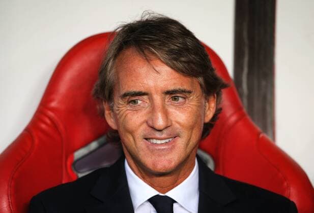 Fußball, Nations League, Portugal - Italien Italy manager Roberto Mancini smiles during the UEFA Nations League - League A - Group 3 match at Estadio da Luz, Lisbon. Picture date 10th September 2018. Picture credit should read: Matt McNulty Sportimage EDITORIAL USE ONLY. No use with unauthorised audio, video, data, fixture lists, club league logos or live services. Online in-match use limited to 120 images, no video emulation. No use in betting, games or single club league player publications.