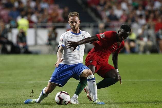 September 10, 2018 - Lisbon, Portugal - Manuel Lazzari of Italy and Spal 2013 (L) vies for the ball with Bruma of Portugal and RB Leipzig (R) during the UEFA Nations League A group football match between Portugal and Italy, in Lisbon, on September 10, 2018. Portugal v Italy - UEFA Nations League A  - ZUMAn230 20180910_zaa_n230_344 Copyright: xCarlosxPalmax