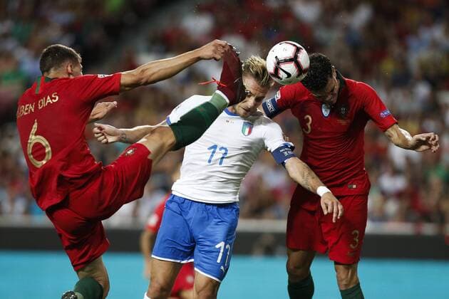 September 10, 2018 - Lisbon, Portugal - Ciro Immobile of Italy and SS Lazio (C) heads for the ball with Ruben Dias of Portugal and SL Benfica (L) and Pepe of Portugal and Besiktas (R) during the UEFA Nations League A group football match between Portugal and Italy, in Lisbon, on September 10, 2018. Portugal v Italy - UEFA Nations League A  - ZUMAn230 20180910_zaa_n230_328 Copyright: xCarlosxPalmax