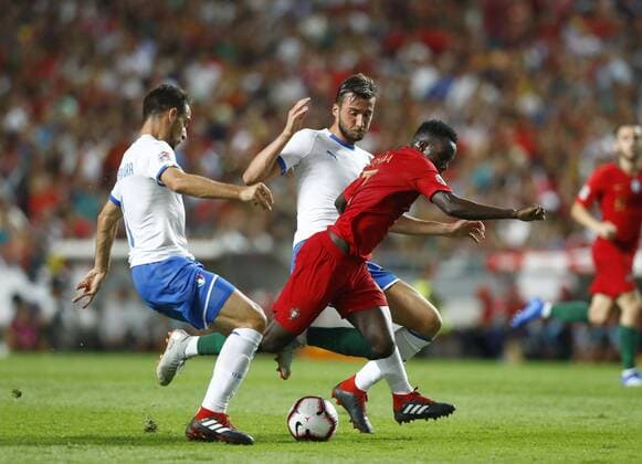 September 10, 2018 - Lisbon, Portugal - Portugal v Italy - UEFA Nations League.Giacomo Bonaventura and Bryan Cristante of Italy with Bruma of Portugal at Estadio da Luz in Lisbon, Portugal on September 10, 2018. Portugal v Italy - UEFA Nations League A  - ZUMAn230 20180910_zaa_n230_305 Copyright: xMatteoxCiambellix