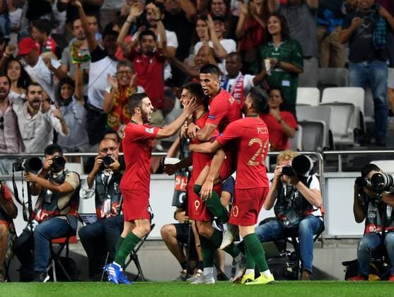 (180911) -- LISBON, Sept.11, 2018 -- Andre Silva (2nd L) of Portugal celebrates after scoring a goal with teammates during the UEFA Nations League soccer match between Portugal and Italy at Luz Stadium in Lisbon, Portugal, on Sept. 10, 2018. Portugal won 1-0. )(wll) (SP)PORTUGAL-LISBON-SOCCER-UEFA-NATIONS LEAGUE-PORTUGAL VS ITALY ZhangxLiyun 