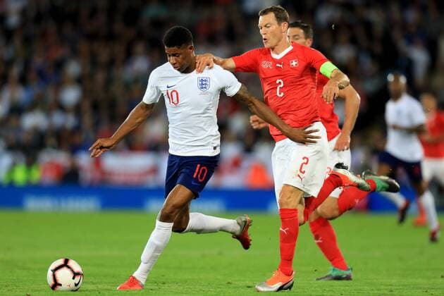 11th September 2018, King Power Stadium, Leicester, England; International Football Friendly, England versus Switzerland; Marcus Rashford of England competes for the ball with Stephan Lichtsteiner of Switzerland  ActionPlus12061788 ShaunxBrooks