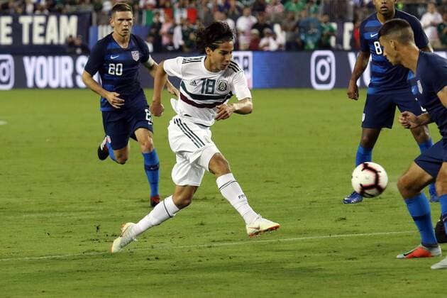 NASHVILLE, TN - SEPTEMBER 11: Mexico midfielder Diego Lainez (18) takes a shot in the game between the United States national team Nationalteam and the Mexico National team on September 11, 2018 at Nissan Stadium in Nashville, Tennessee. (Photo by Michael Wade Icon Sportswire) SOCCER: SEP 11 Mexico v USA Icon09111835 EDITORIAL USE ONLY