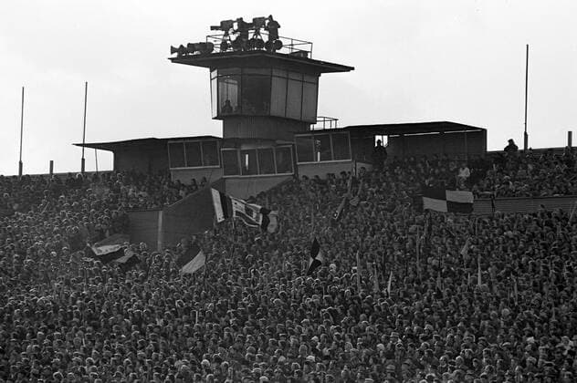 SG Dynamo Dresden 1 FC Magdeburg Football DDROberliga Season 1975 1976 20 Round 27 03 1976 SG Dynamo Dresden1 FC Magdeburg Rudolf Harbig Stadium Dresden Dynamo fans on the opposite tribune later Hornbach tribune Dresden Saxony Germany